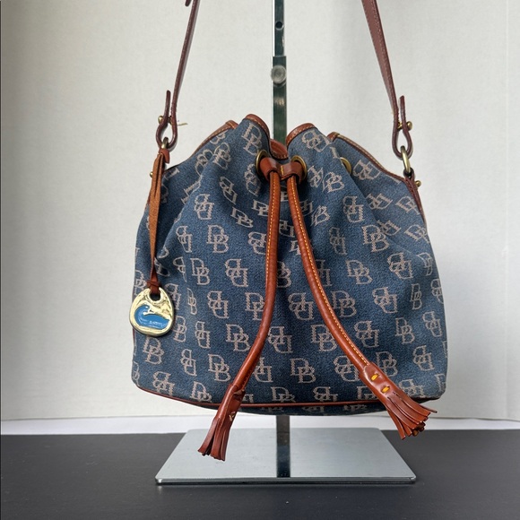 Dooney & Bourke Handbags - Vintage small Dooney & Bourke blue canvas logo bucket bag purse